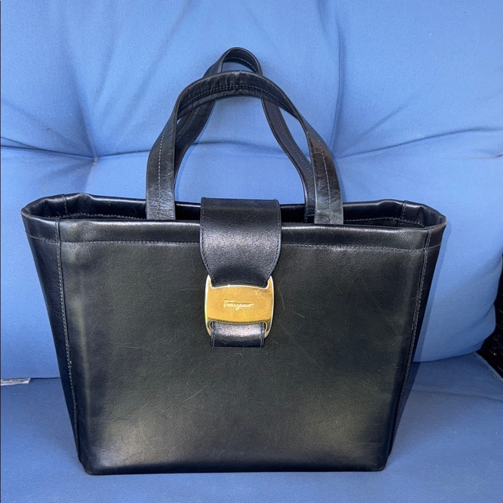 Salvatore Ferragamo Black and Gold Tote Bag with Structured Design